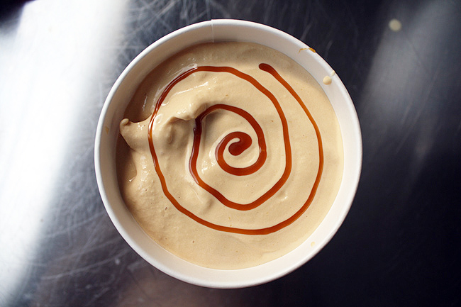caramel ice cream with a swirl of salted caramel sauce