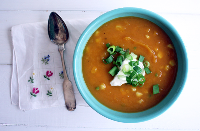 a bowl of sweet potato, corn, and jalapeño soup
